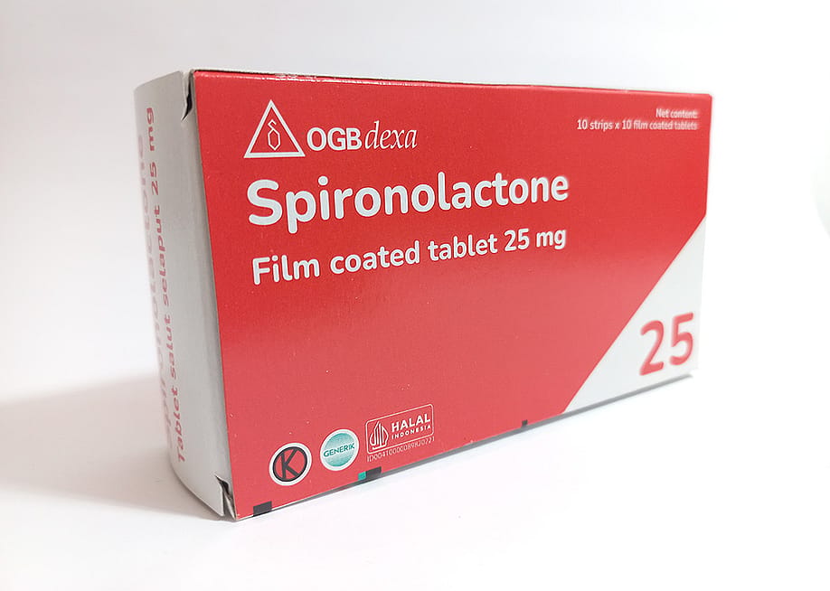 A box of Spironolactone 25 mg film-coated tablets in a white background. — anggraenilini3011 // Shutterstock