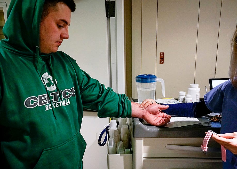 Stephen Barber being checked by a nurse before receiving a dose of suboxone at Serenity at Summit rehabilitation center in Haverhill, Massachusetts, USA. — Gabe Souza // Portland Portland Press Herald via Getty Images
