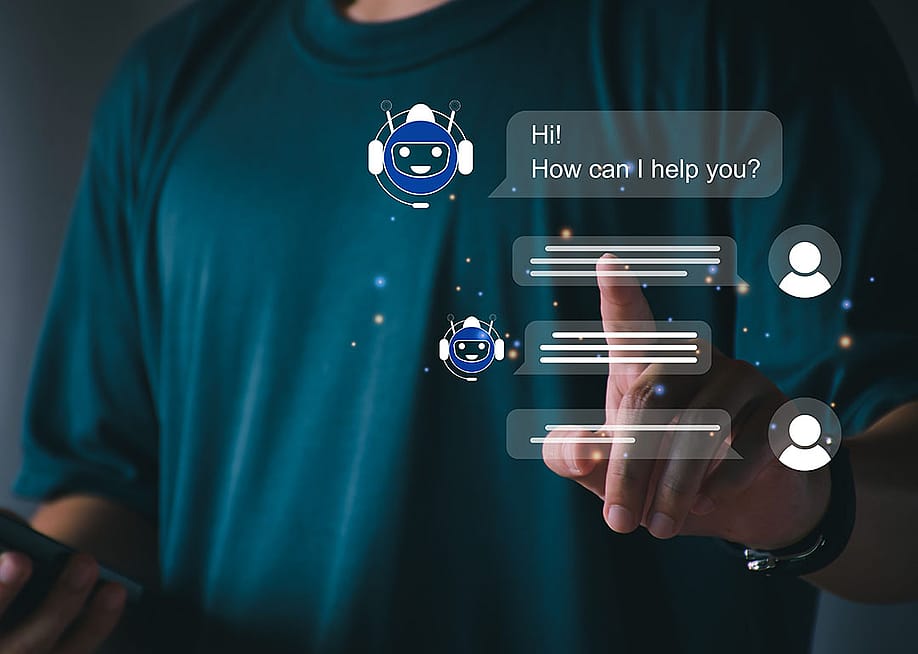 A person utilizing an AI chatbot that responds to online messages or inquiries. — AKACHA // Shutterstock