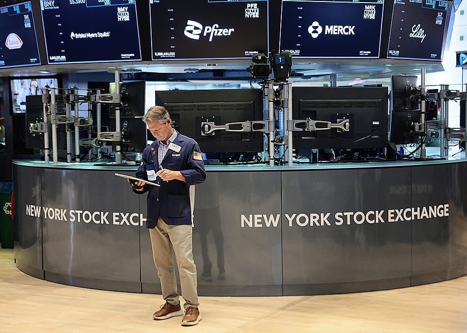 Traders work on the floor of the New York Stock Exchange during morning trading on June 26, 2026 in New York City. — Michael M. Santiago // Getty Images