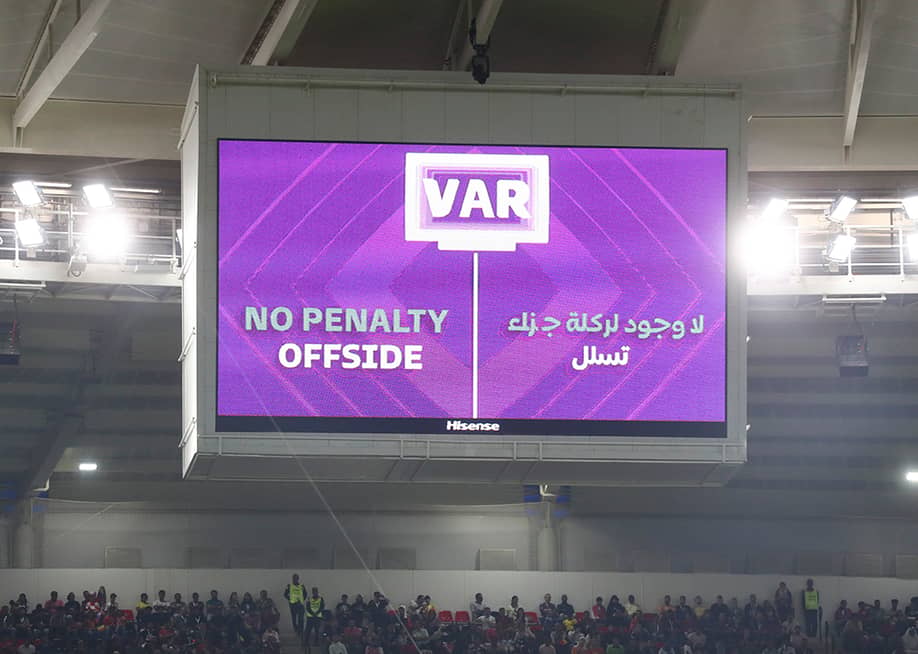 VAR decision, no penalty for offside displayed from the stadium's big screen during the FIFA World Cup Qatar 2022 Group F match between Croatia and Belgium. — James Williamson // AMA / Getty Images