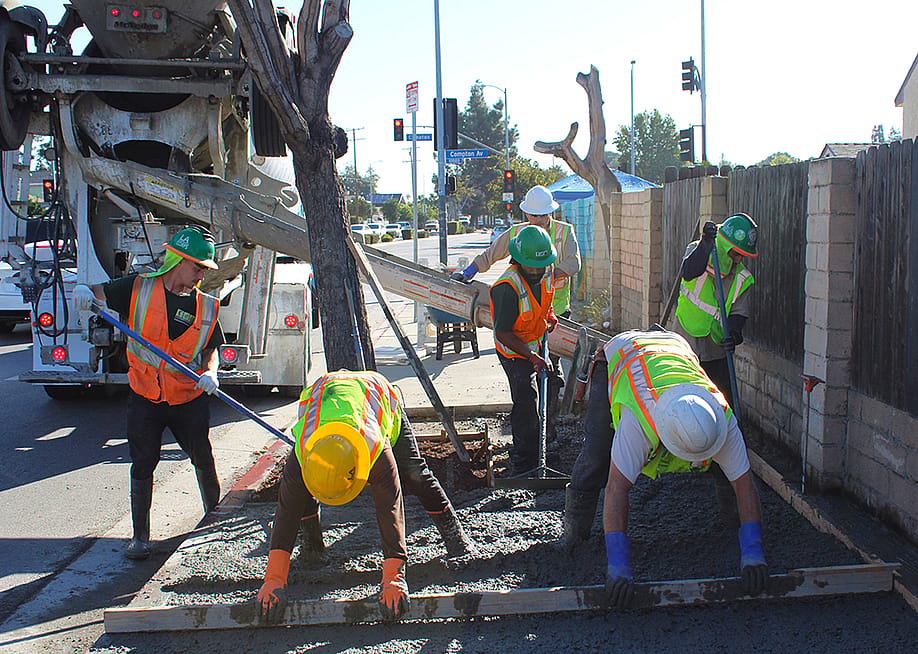 Construction crew doing a sidewalk repair work at day. — Courtesy of LA Conservation Corps