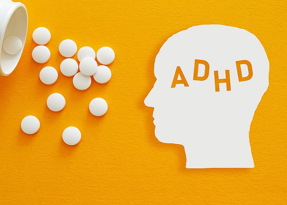 A conceptual illustration of providing medication to ADHD patients. — Jack_the_sparow // Shutterstock
