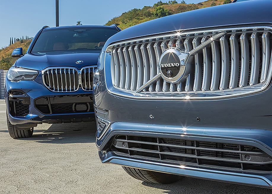 BMW X5 and Volvo XC90 cars parked together. — CarMax