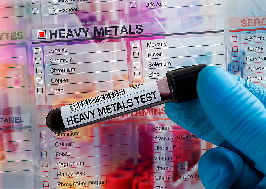 A blood sample tube collected for heavy metals test in a laboratory. — angellodeco // Shutterstock
