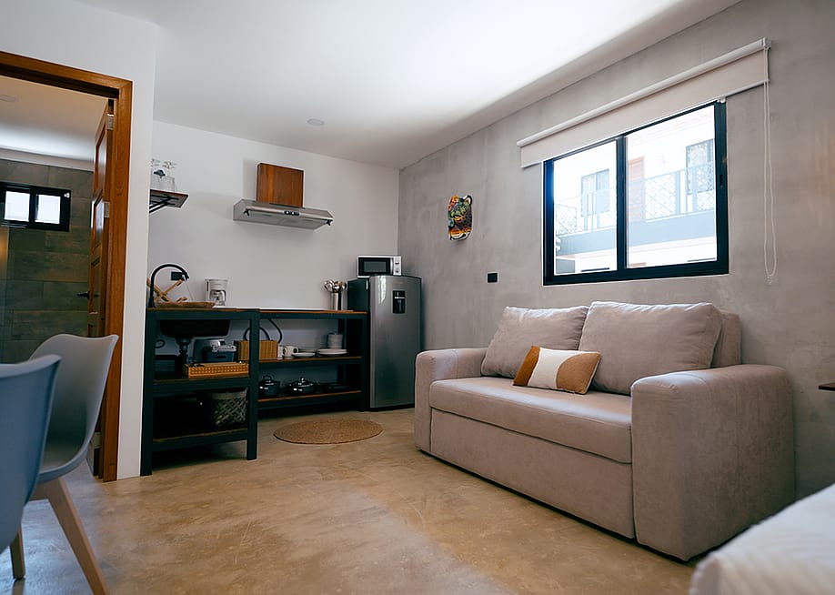 A contemporary modern studio apartment with a minimalist design. — Daniel Megias // Shutterstock