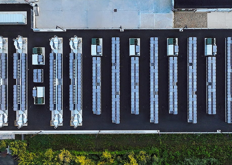 An aerial, top-down view of an industrial scale power storage system within a facility. — Bloom Energy