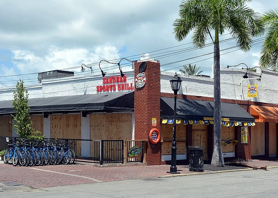 A sports bar boarded up and closed their hurricane shutters for safety protection before Hurricane Irma in Key West, Florida, USA. — Chuck Wagner // Shutterstock