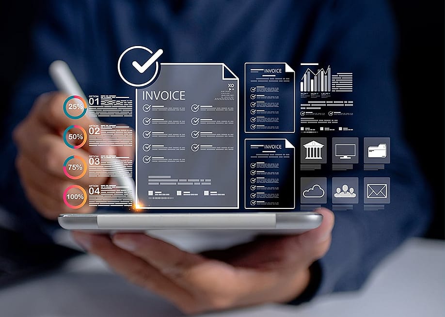 A finance analyst utilizing an automated and central invoice database and related management data charts from a work tablet. — DJSPIDA FOTO // Shutterstock