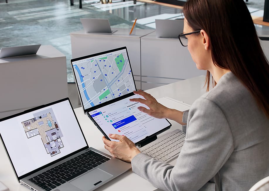 A female real estate agent organizing property listings. — Andrey_Popov // Shutterstock