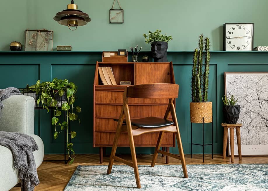 A cozy modern and retro interior design of a work space at home. — Followtheflow // Shutterstock