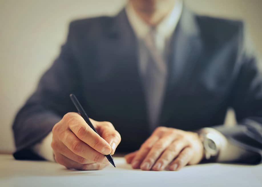 A car agent signing a contract. — Ollyy // Shutterstock