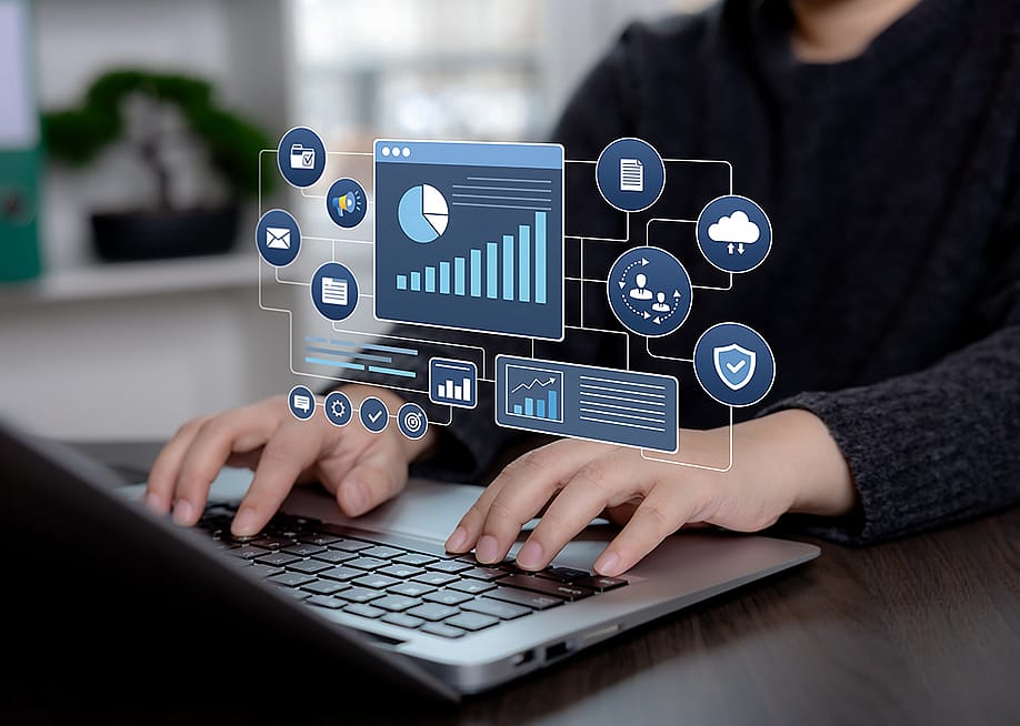 Business professional using an analytics dashboard interface — Tapati Rinchumrus // Shutterstock