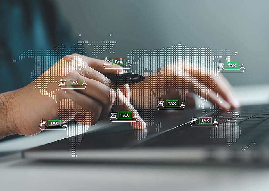 Businessman illustrated with global import and export tax graphics. — bixstock // Shutterstock