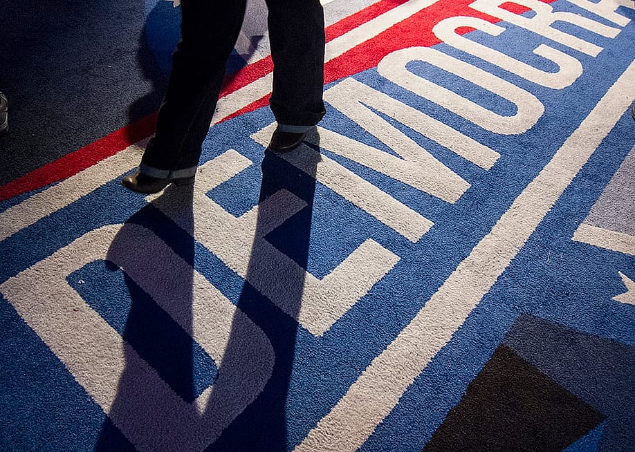 Man stepping on ground painted for the Democracy Plaza in New York City. — Viviane Moos // Corbis via Getty Images