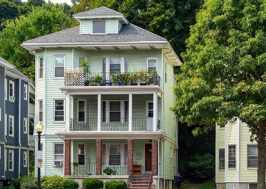 A multi-story and multi-family residential home — Artography // Shutterstock