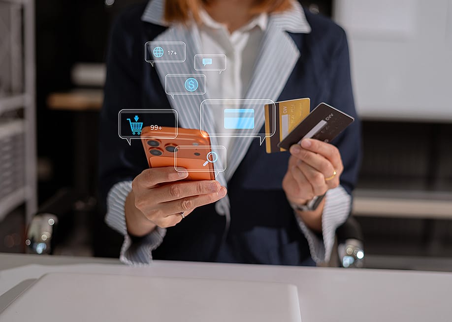 A finance officer assessing a few business credit cards for their company. — THICHA SATAPITANON // Shutterstock