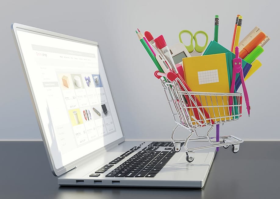 School supplies and stationery for sale in an online shopping website's cart from a laptop. — rawf8 // Shutterstock