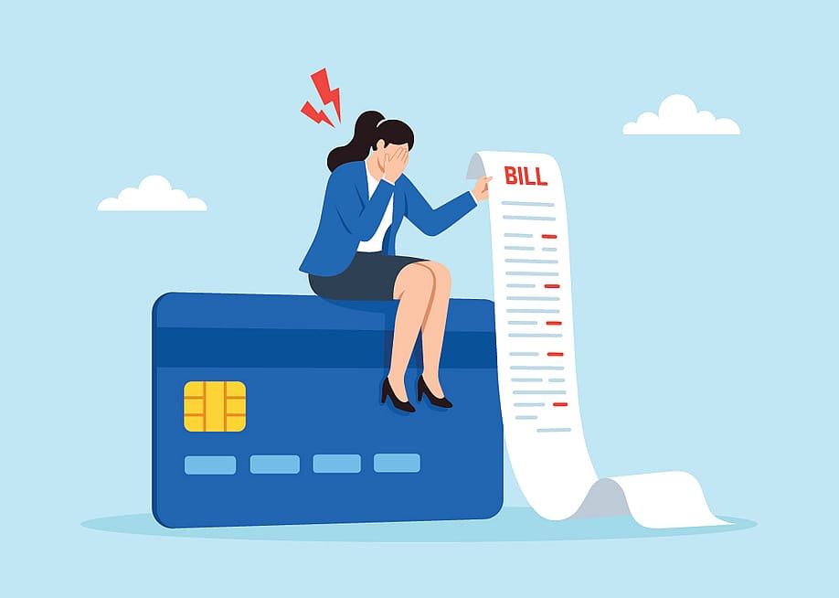 An illustration of a businesswoman sitting on top of a credit card while holding a long bill representing the concept of overspending. — VZ_Art // Shutterstock