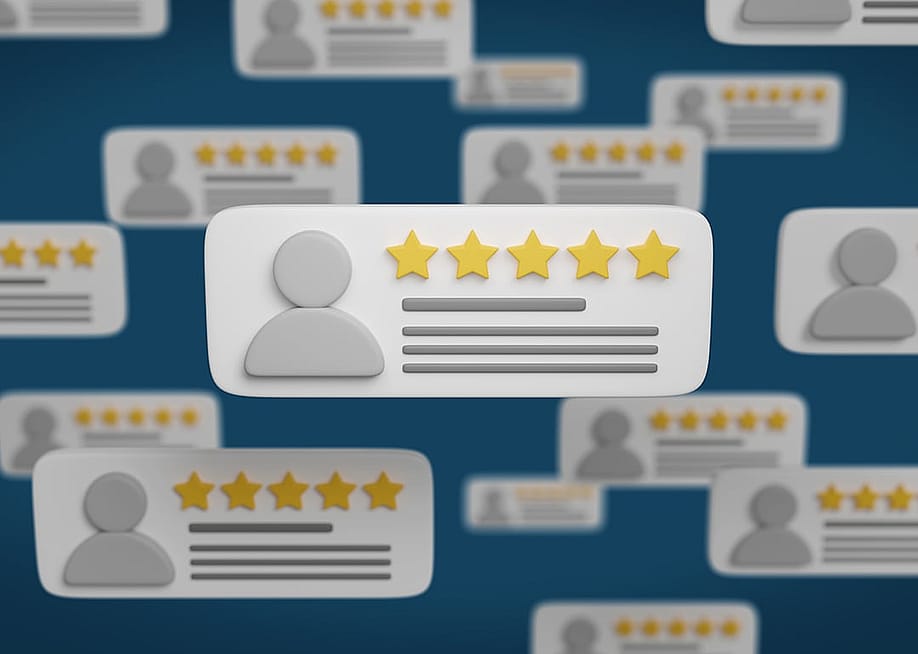 An illustration of anonymous 5-star online reviews of users floating in a background. — Juan Roballo // Shutterstock