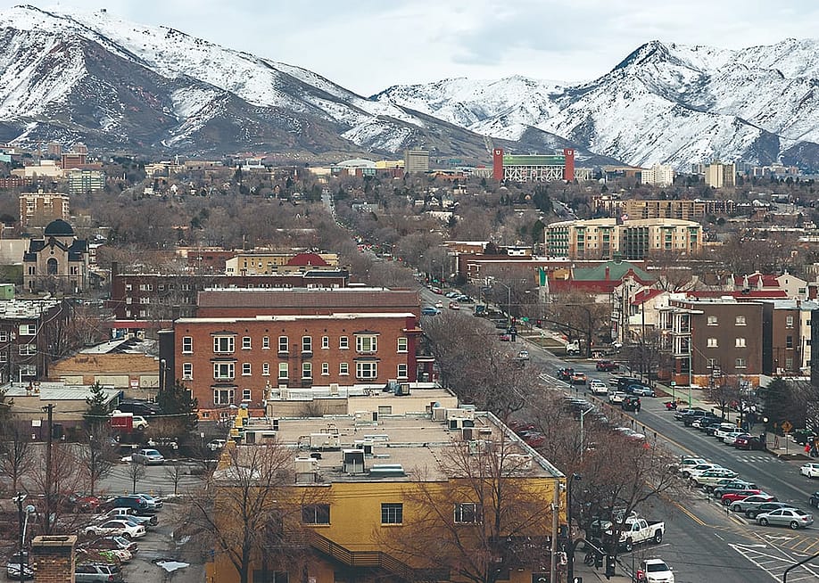 A wide-angle view of downtown Salt Lake City and looking east at the mountains in Utah, USA. — Anne Stephenson // Shutterstock