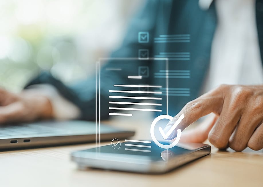 An IT professional managing data and digital protection for a company's privacy management. — Garun .Prdt // Shutterstock