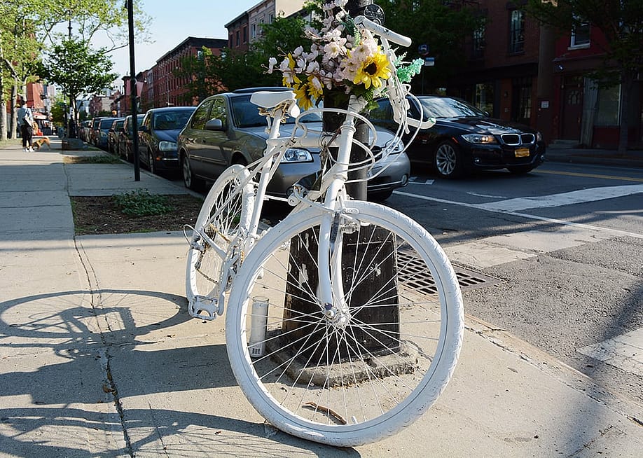 A white bike in memory of a killed cyclist. — Cory Seamer // Shutterstock