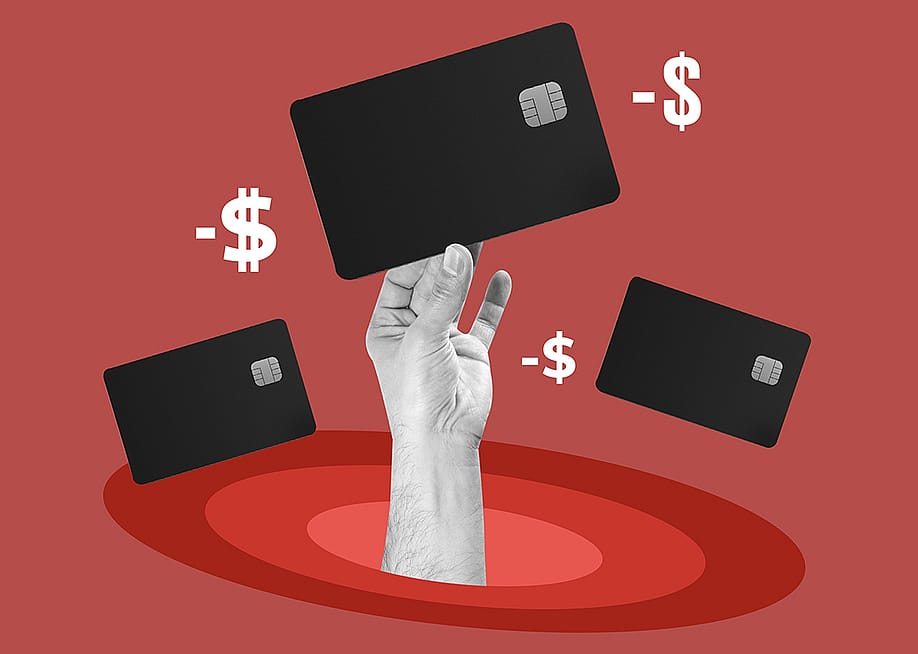 A custom illustration of a hand holding up a credit card — N Universe // Shutterstock