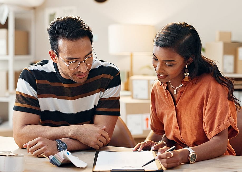 Two colleagues in a training in an office. — PeopleImages // Shutterstock