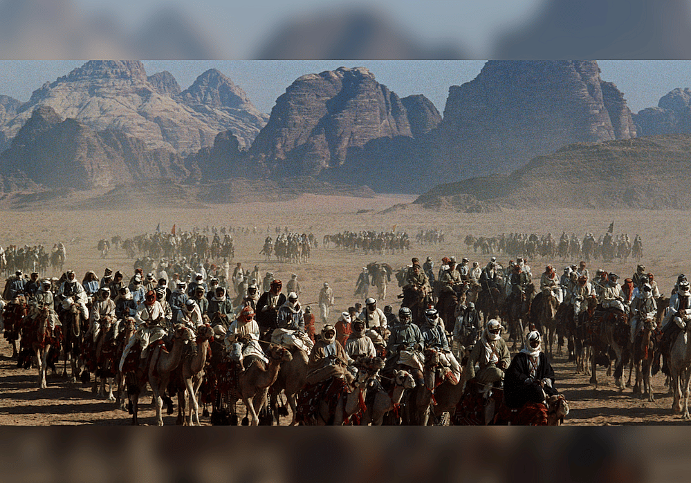 Camel caravan across Arabian desert